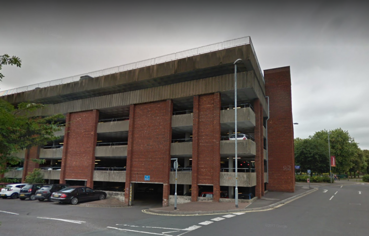 Woman pronounced dead after being found at bottom of multi-storey car park