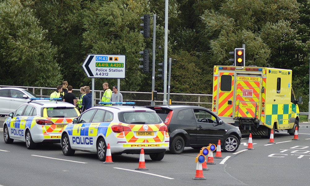 Police and ambulance at scene of road traffic collision near Greenbridge