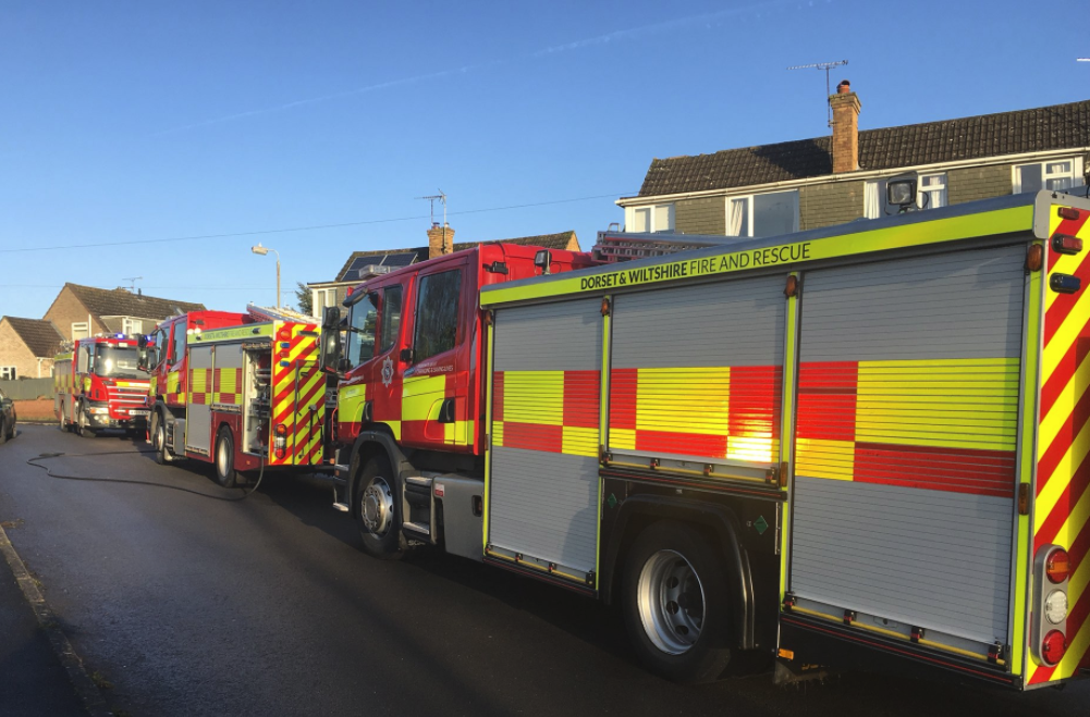 Woman rescued and unconscious dog resuscitated after house fire in
