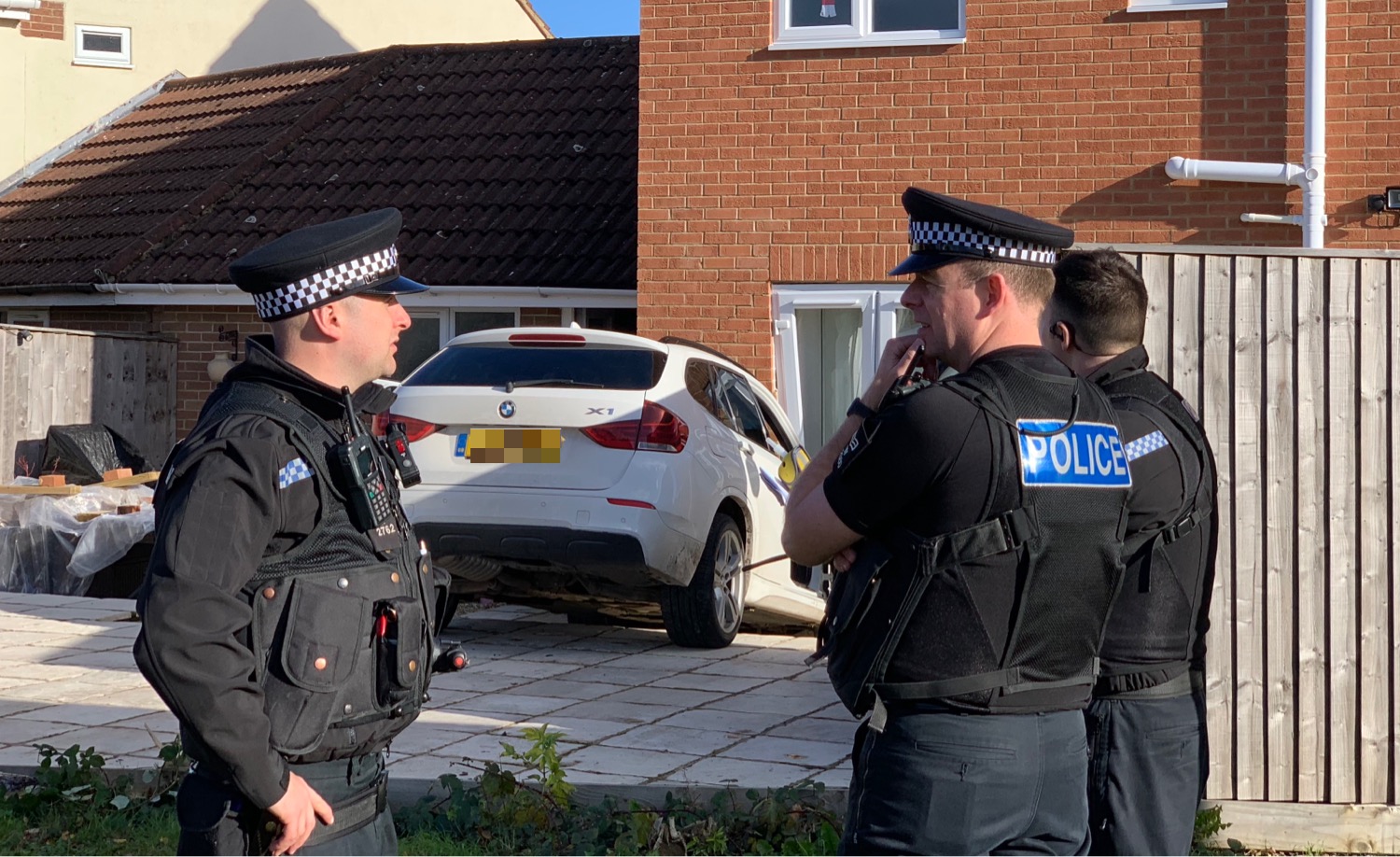 BREAKING: Car crashes through garden fence and into house in Swindon