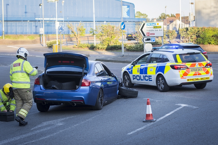 Driver tries to flee crash in damaged BMW but ditched it when wheel fell off