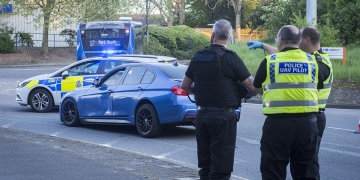 Driver tries to flee crash in damaged BMW but ditched it when wheel fell off