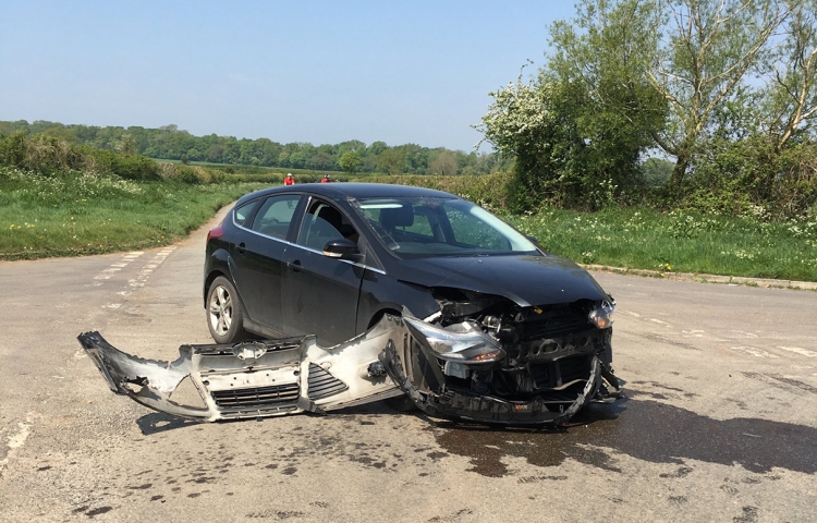 Road partially blocked after crash on countryside crossroads near Chippenham