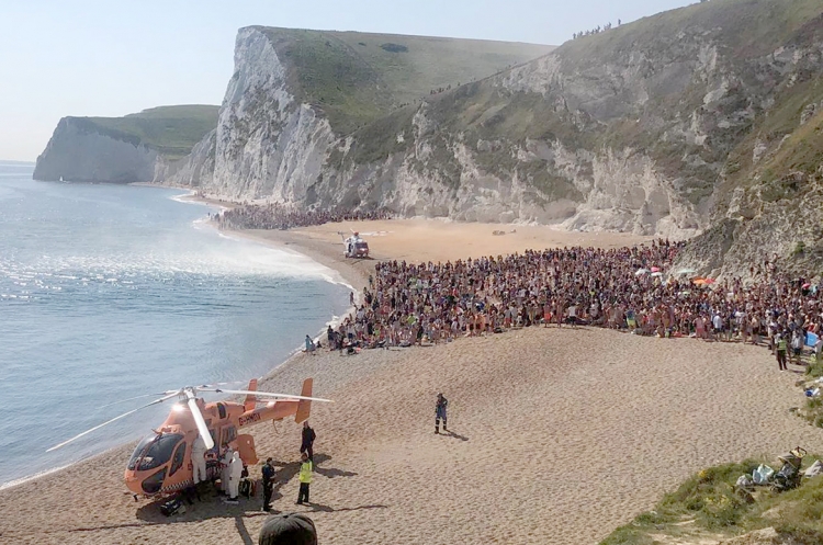 NATIONAL: Social distancing impossible as helicopters land on Dorset beach