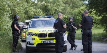 Armed police detain men at gunpoint on roundabout near Coate Water