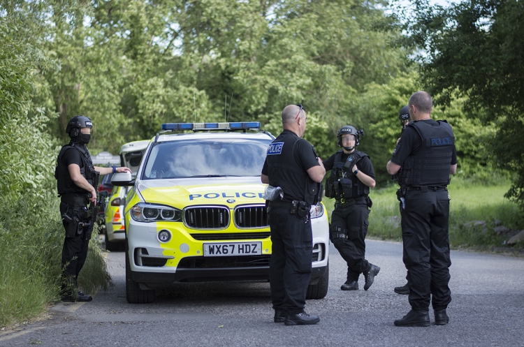 Armed police detain men at gunpoint on roundabout near Coate Water