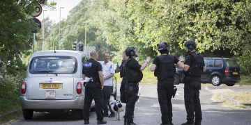 Armed police detain men at gunpoint on roundabout near Coate Water