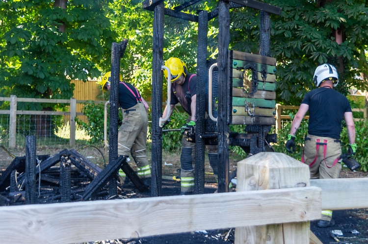 Police investigation launched after suspected arson attack destroys play area