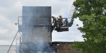 Ten fire engines attending blaze at timber yard in village near Calne