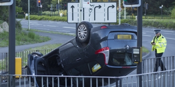 Woman driver injured after hitting traffic light and flipping car in Swindon