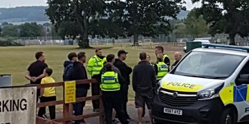 Police called as travellers move onto school field after smashing through gates