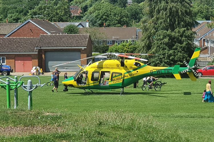 Air ambulance lands in Marlborough as casualty treated by medics in street