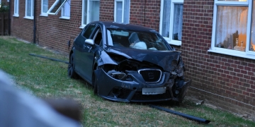 Car crashes through garden and into sheltered housing complex in Swindon