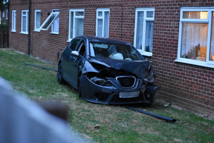 Car crashes through garden and into sheltered housing complex in Swindon