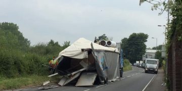 A36 blocked as lorry strikes low bridge in Wilton shedding its load