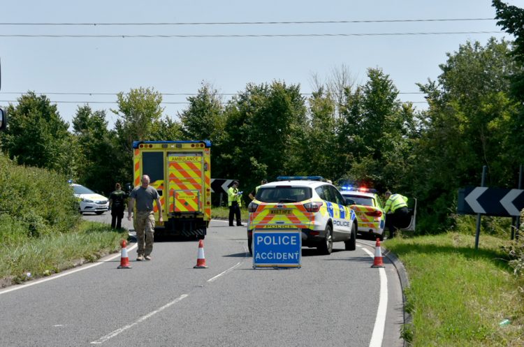 Cyclists collide with each other on sharp bend on country road in Trowbridge