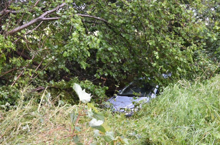 Car leaves road down embankment on A366 near Farleigh Hungerford Castle