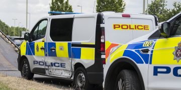 Police vehicle and car involved in crash on Thamesdown Drive in Swindon