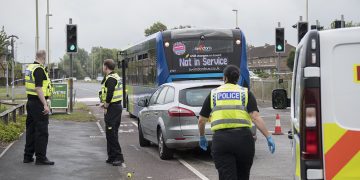 Main road in Swindon closed after car hits child riding scooter