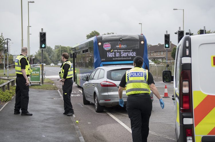 Main road in Swindon closed after car hits child riding scooter