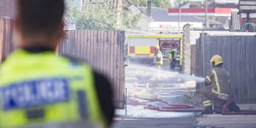 Explosions heard as firefighters battle blaze at back of house in Swindon
