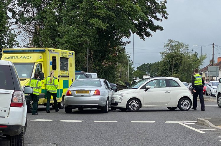Two-vehicle crash on roundabout partially blocks main road in Swindon