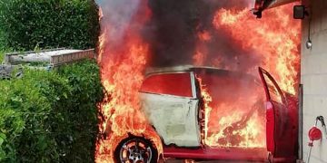 Firefighters extinguish a raging fireball outside a property in Devizes