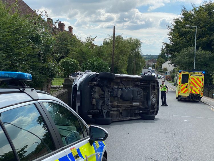 Royal Wootton Bassett road closed as van hits wall and overturns
