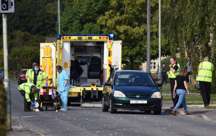 Swindon road closed in both directions as paramedics treat injured moped rider