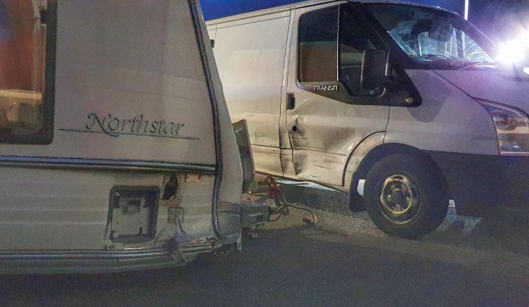 Man suspected of ramming police car with van towing caravan charged