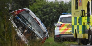 Emergency services called to free man from car after crashing into ditch