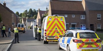Riot vans respond to reports of mass disorder breaking out in Swindon