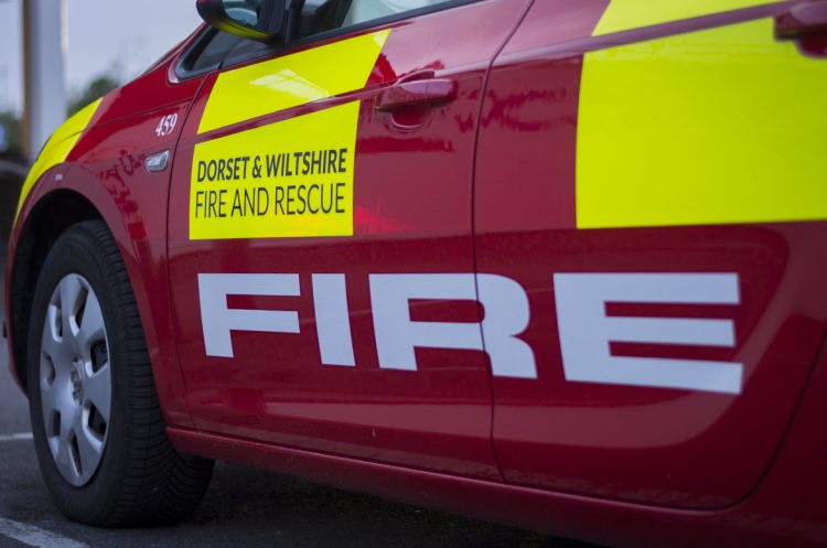 Firefighters use fan to clear Salisbury property of smoke after microwave fire