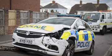 Police vehicle collides with car whilst responding to 999 call in Swindon