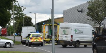 Road on Melksham industrial estate closed after van and cyclist collide