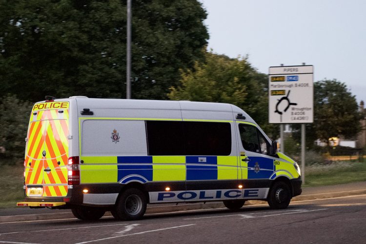 Riot vans patrol Swindon as businesses take security measures ahead of rave
