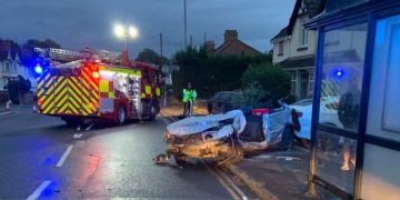 Firefighters extricate casualty from car after it rolls down hill in Swindon