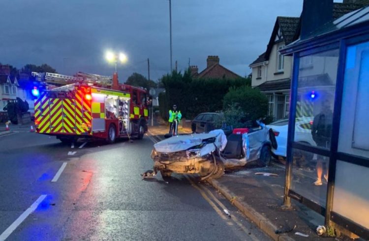 Firefighters extricate casualty from car after it rolls down hill in Swindon