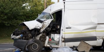 Passenger of van trapped in cab after colliding with lorry near Swindon