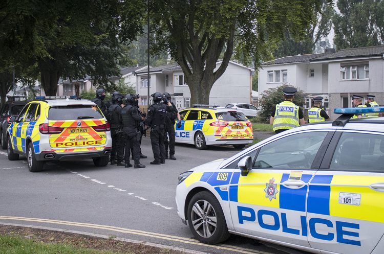 Road closed as armed police raid house in search of suspect in Swindon
