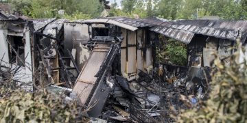 Neighbours dragged man from burning mobile home after spotting smoke