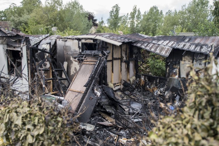 Neighbours dragged man from burning mobile home after spotting smoke