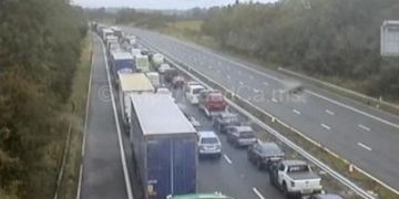 M4 blocked in both directions as emergency services attend overturned car