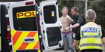 Suspect in ‘crack den’ arson attack detained fleeing the scene by police dog