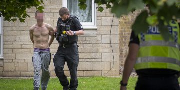 Suspect in ‘crack den’ arson attack detained fleeing the scene by police dog