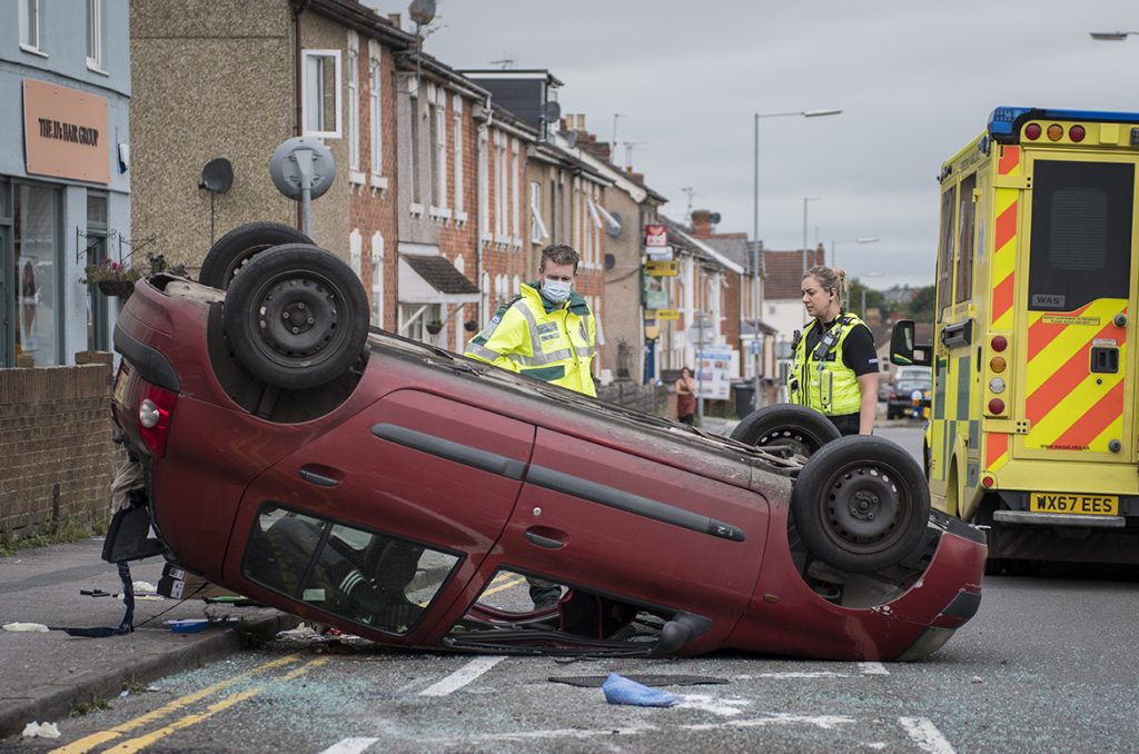 Swindon town centre road closed as car overturns in dramatic afternoon