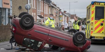 Swindon town centre road closed as car overturns in dramatic afternoon crash