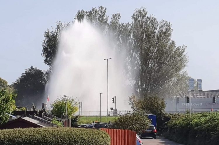 Vehicles and pedestrians pelted with stones and mud as water main bursts