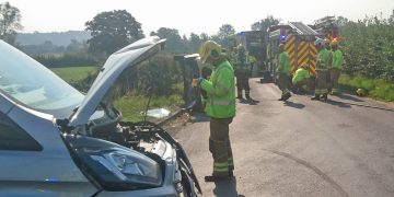 Fire crews rescue injured woman from overturned car on country road near Calne
