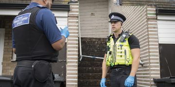 Police hunt suspect after man knifed in the neck and hit over head with brick